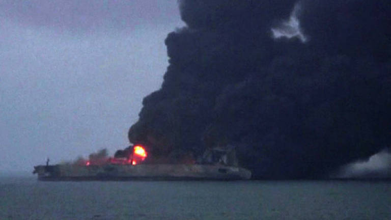 Explosion risk for oil tanker ablaze off China: Authorities