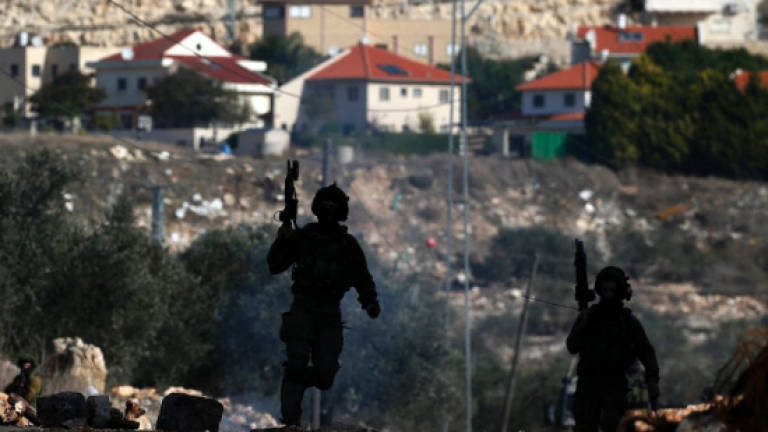 Israel pushing for more settler homes despite UN vote