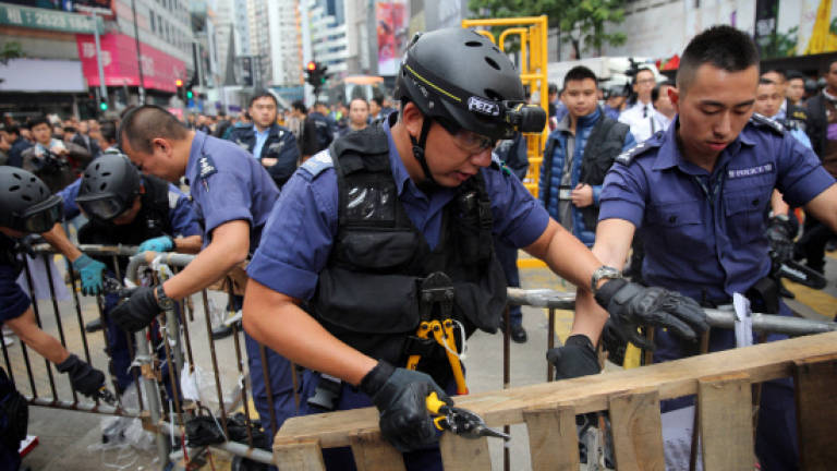 Hong Kong leader declares Occupy protest 'over' as last site cleared