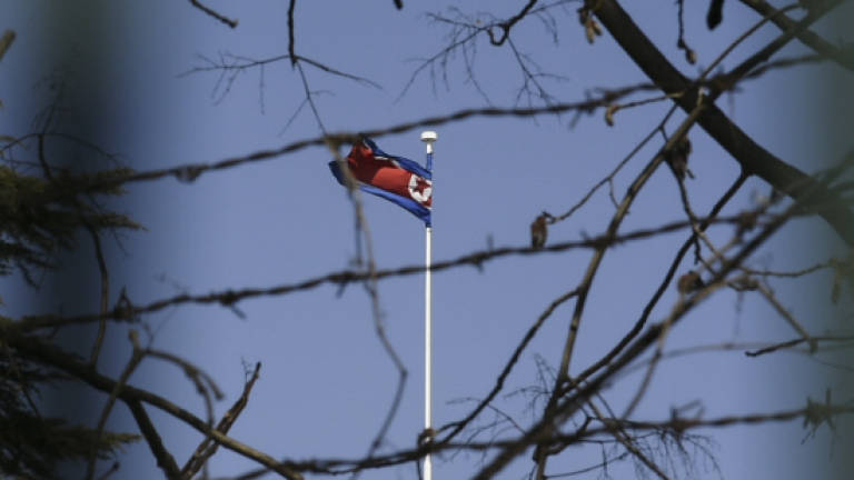 N. Korea goes 'my way' with missiles and murder row