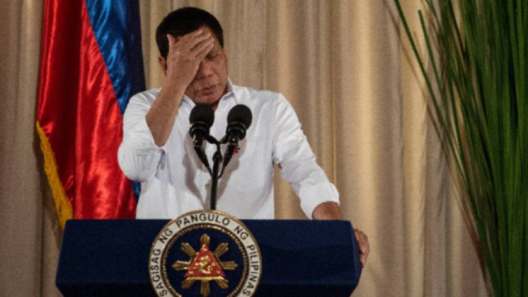 Duterte takes a rest as Philippine city burns
