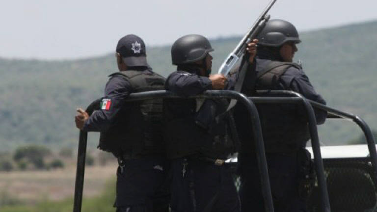 Criminals down police helicopter in Mexico, four dead