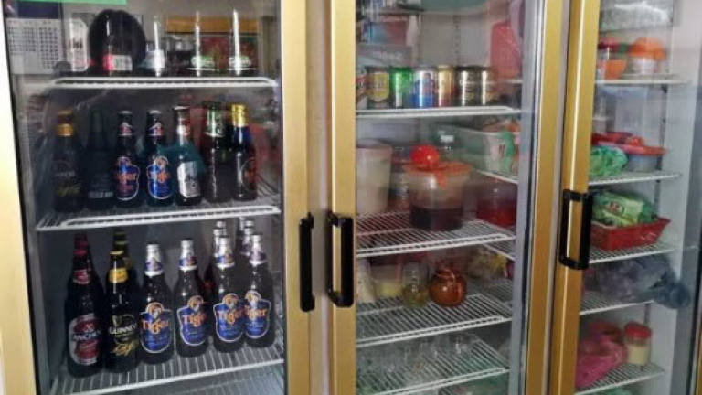 Eateries raided for placing greens and alcoholic beverages in same fridge
