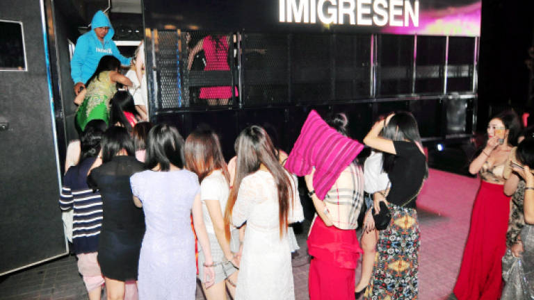 Penang Immigration detains nine female GROs, 15 men