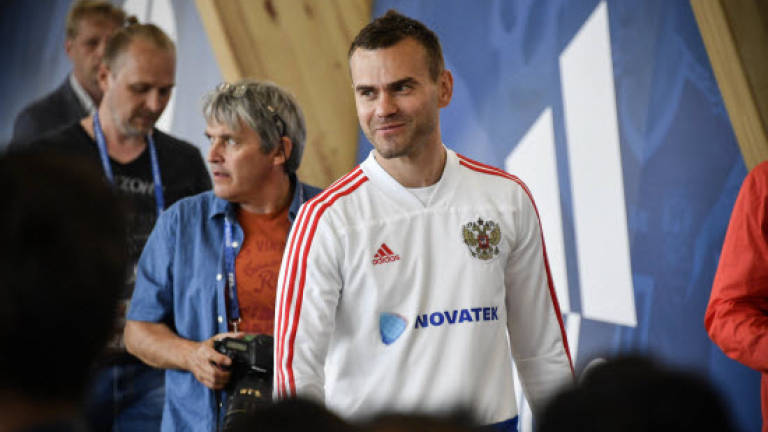 Akinfeev's 'Foot of God' answers Russia's World Cup prayers