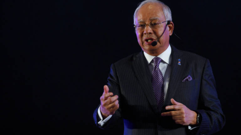 Najib open to out-of-court settlement with Pua