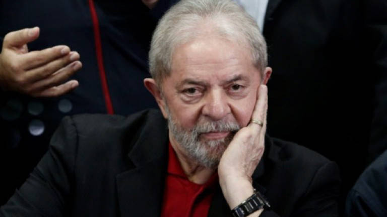 Brazil judge freezes ex-president Lula's assets after conviction
