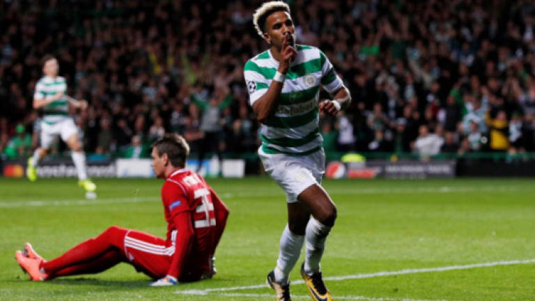 Five-goal Celtic put one foot in Champions League group stage
