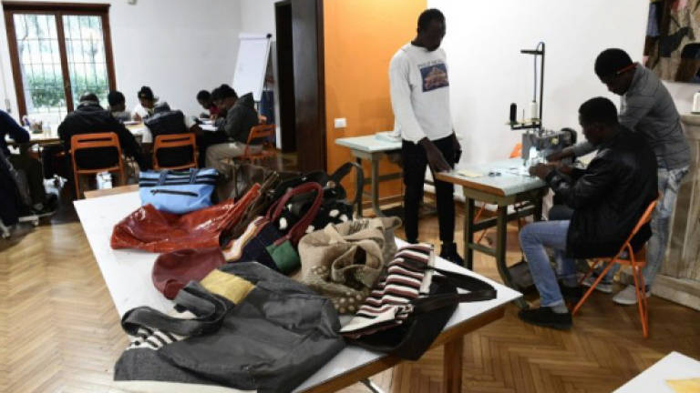 From Libya's migrant hell to Italy's handbag fashion world