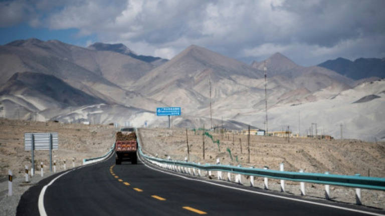 For Pakistanis, China 'friendship' road runs one way