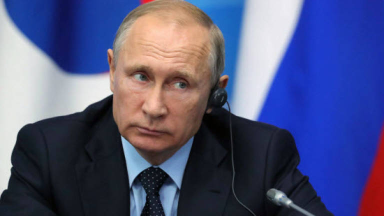 Putin calls for 'culture of no tolerance' to doping