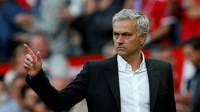 Mourinho has dig at 'quiet' Man Utd supporters