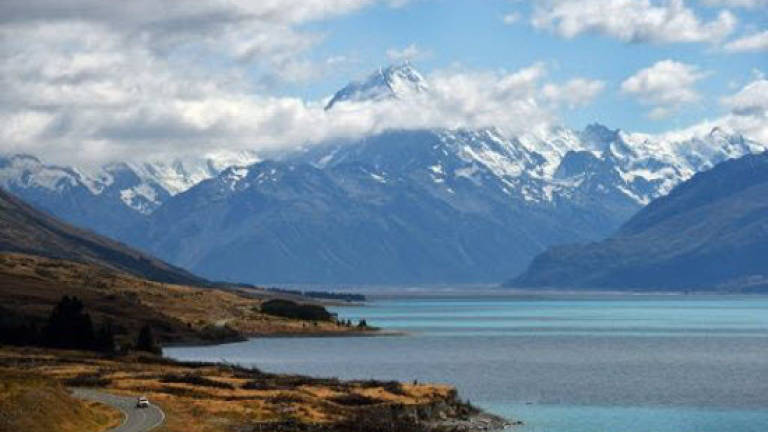 New Zealand to tax tourists as influx grows