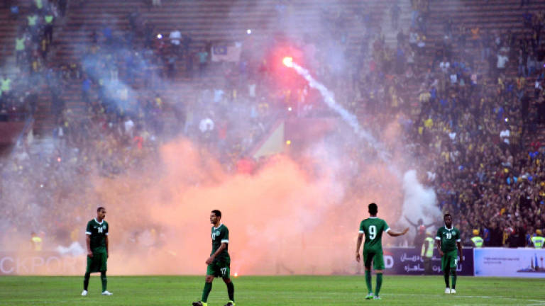 M'sia, Saudi Arabia match stopped over fans' wild antics