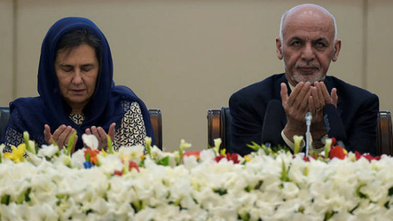 Afghan president unveils plan for peace talks with Taliban