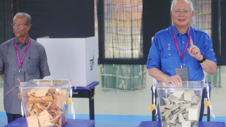 Najib wishes happy voting to M'sians