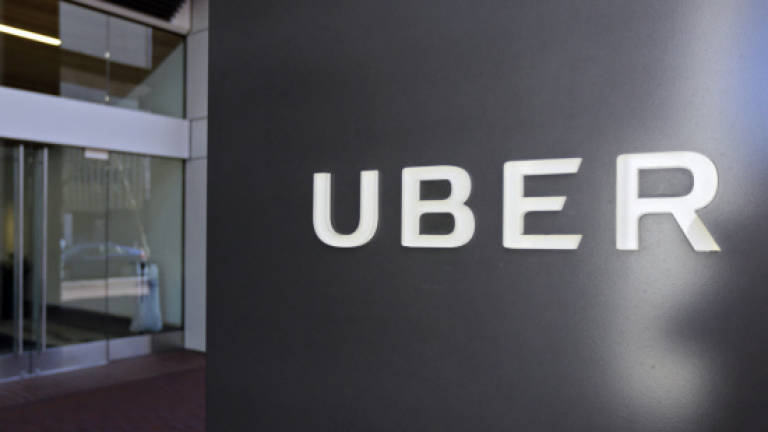 Controversy-battered Uber hires top legal officer