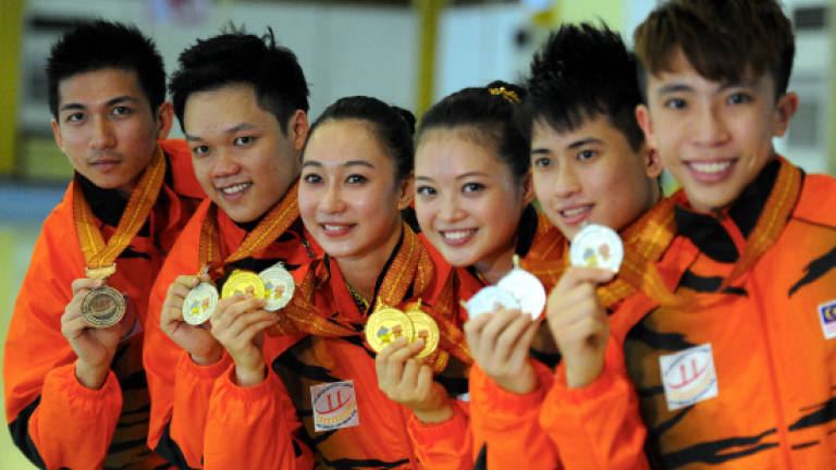 Malaysia's wushu squad bags another gold, silver medal in Palembang