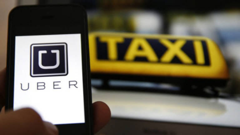 Cab companies to collaborate with Uber