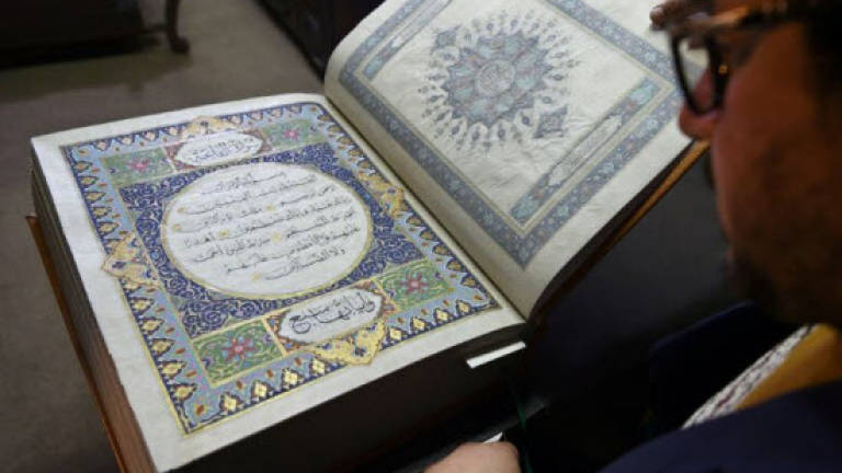 Rare silk Koran helps preserve Afghanistan's cultural heritage