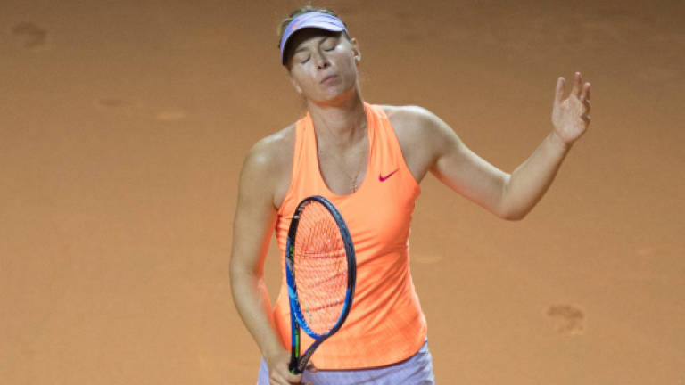 Sharapova vows to 'rise again' after French Open snub