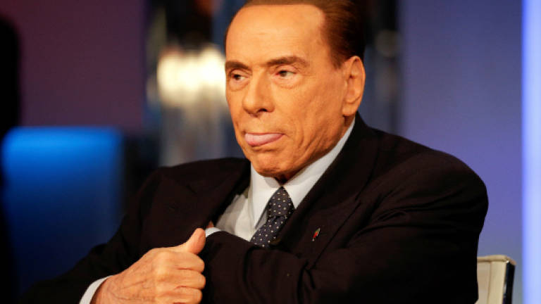 Italian tribunal lifts ban on Berlusconi holding public office