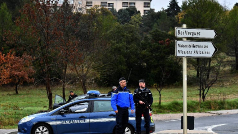 Man held over killing in French missionaries home