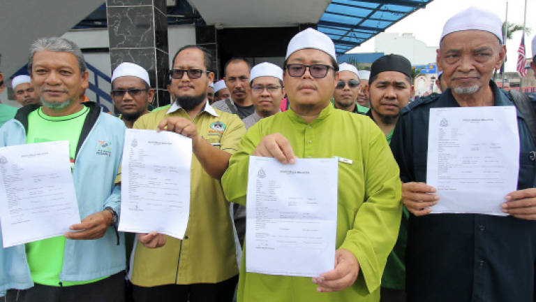 PAS lodges police reports against Siti Kasim, David Orok