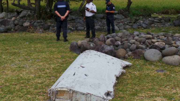 MH370: Debris exposes divisions over air crash probe