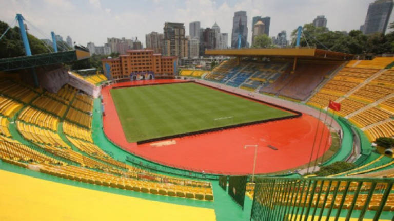 Chinese team repaints stadium gold for luck - and it works
