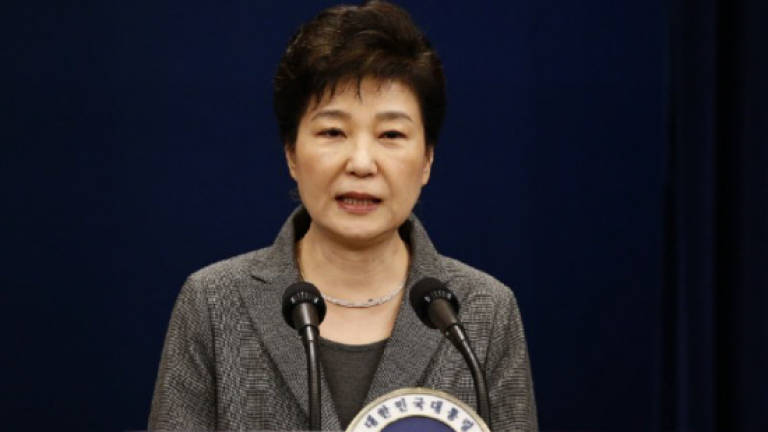 Impeached South Korea president tells court of 'regret'
