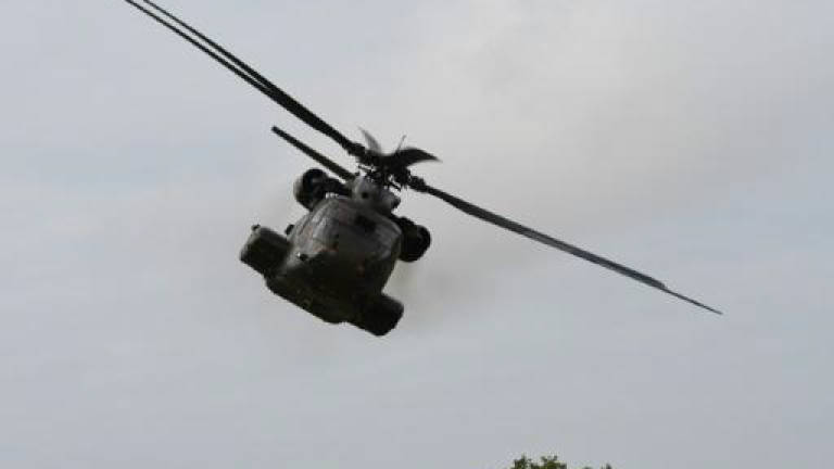 Japan complains to US over resumed chopper flights