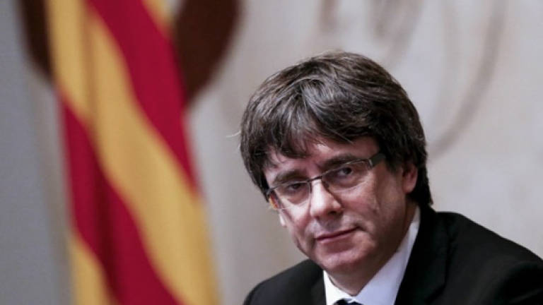 Catalan leader warns Spain takeover will escalate crisis