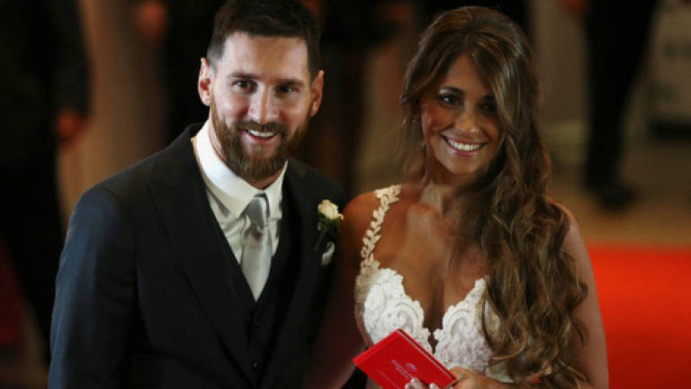Football star Messi weds childhood sweetheart