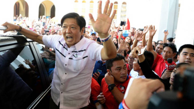 Marcos threatens legal action after Philippine election loss