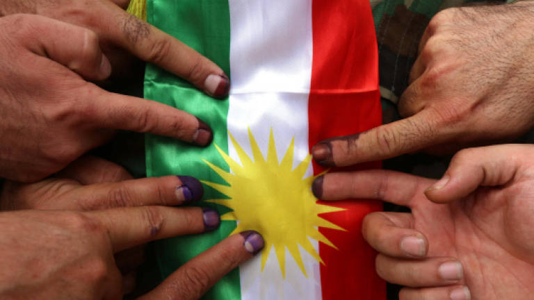 Iraq Kurds defy Baghdad in historic independence vote