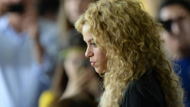 Shakira world tour promoters pull 'inadvertent' Nazi symbol