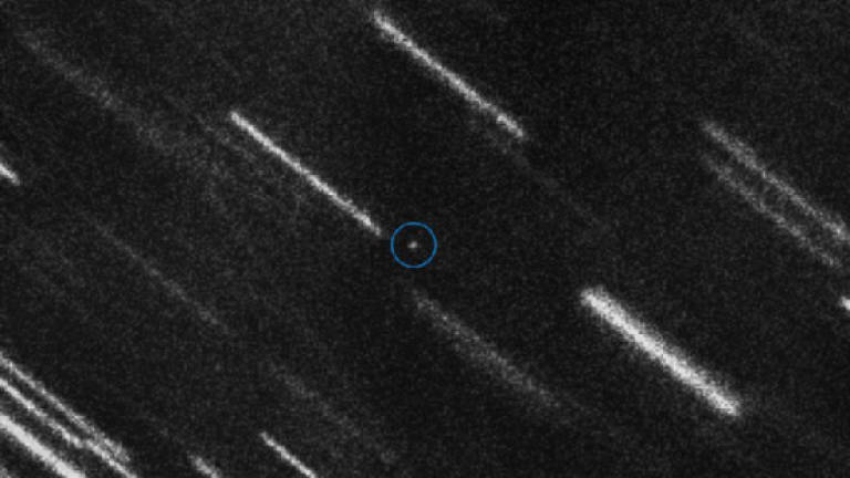 Asteroid grazes past Earth in 'critical' rehearsal