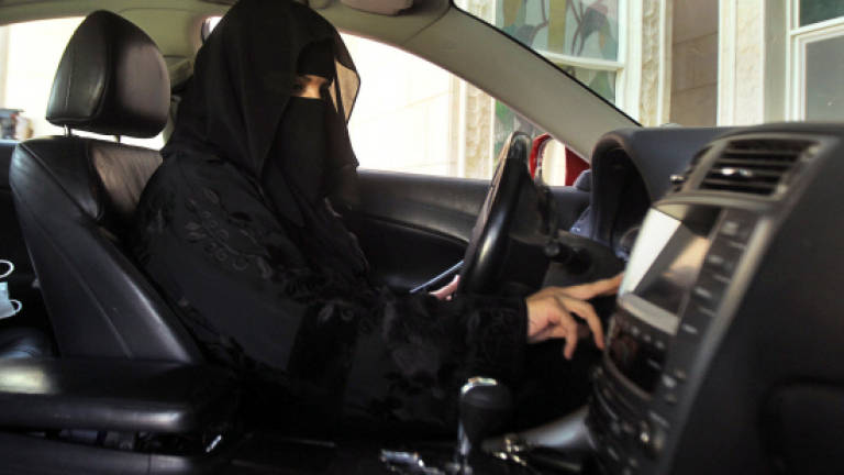 Saudi Arabia to allow women to drive, in historic decision