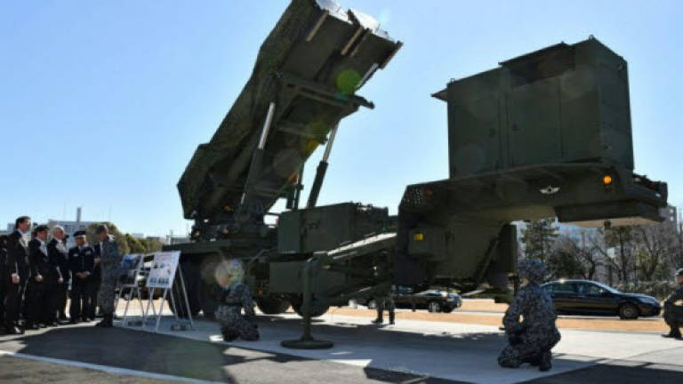 Japan eases North Korea missile alert system