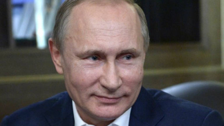 Western sanctions 'severely' harming Russia: Putin