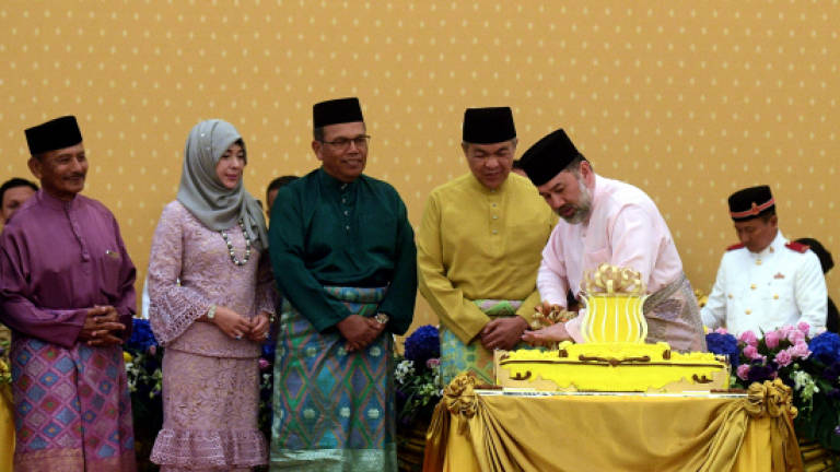 Agong graces royal tea reception in conjunction of birthday