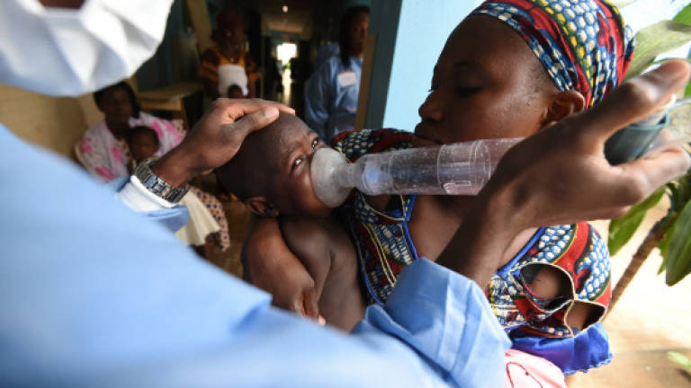 Massage gives infants breath of life in Ivory Coast