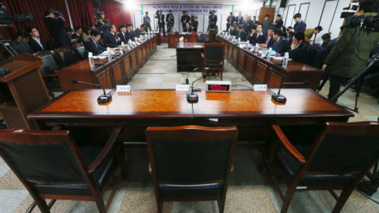 Lawmakers quiz S. Korea's elusive 'Rasputin'