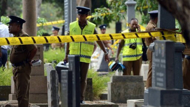 Sri Lankan police exhume body of prominent slain editor