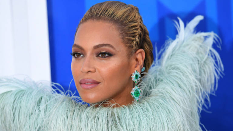 Beyonce leads Grammy nominations in crowded field