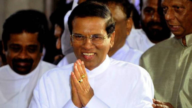 Sri Lanka vows Tamil autonomy despite Buddhist resistance