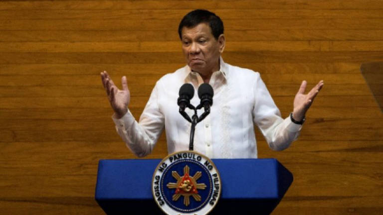 Philippines' Duterte warns of 'revolutionary government'