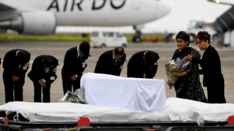 Japanese victims of Dhaka siege arrive home