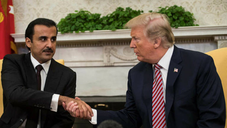 Trump welcomes Qatari Emir in from the cold